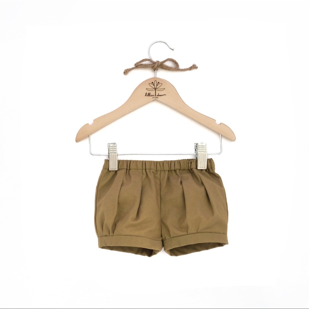 Toddler boy pleated bubble linen shorts in dark khaki. Etsy boutique.